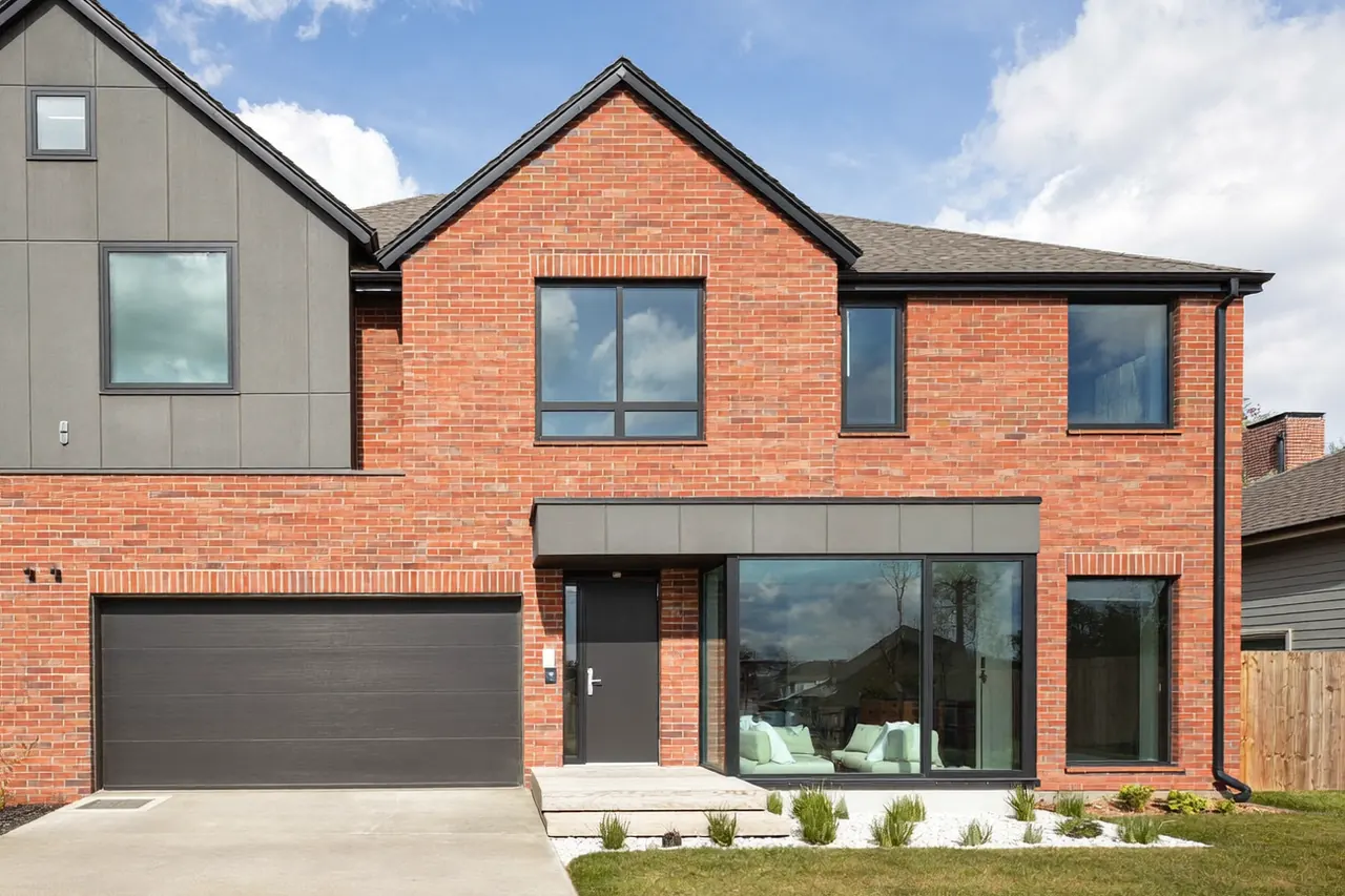 Semi-detached house with all new white windows and a matching front door freshly fitted